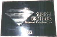 Cut Letters in Brass and Stainless Steel